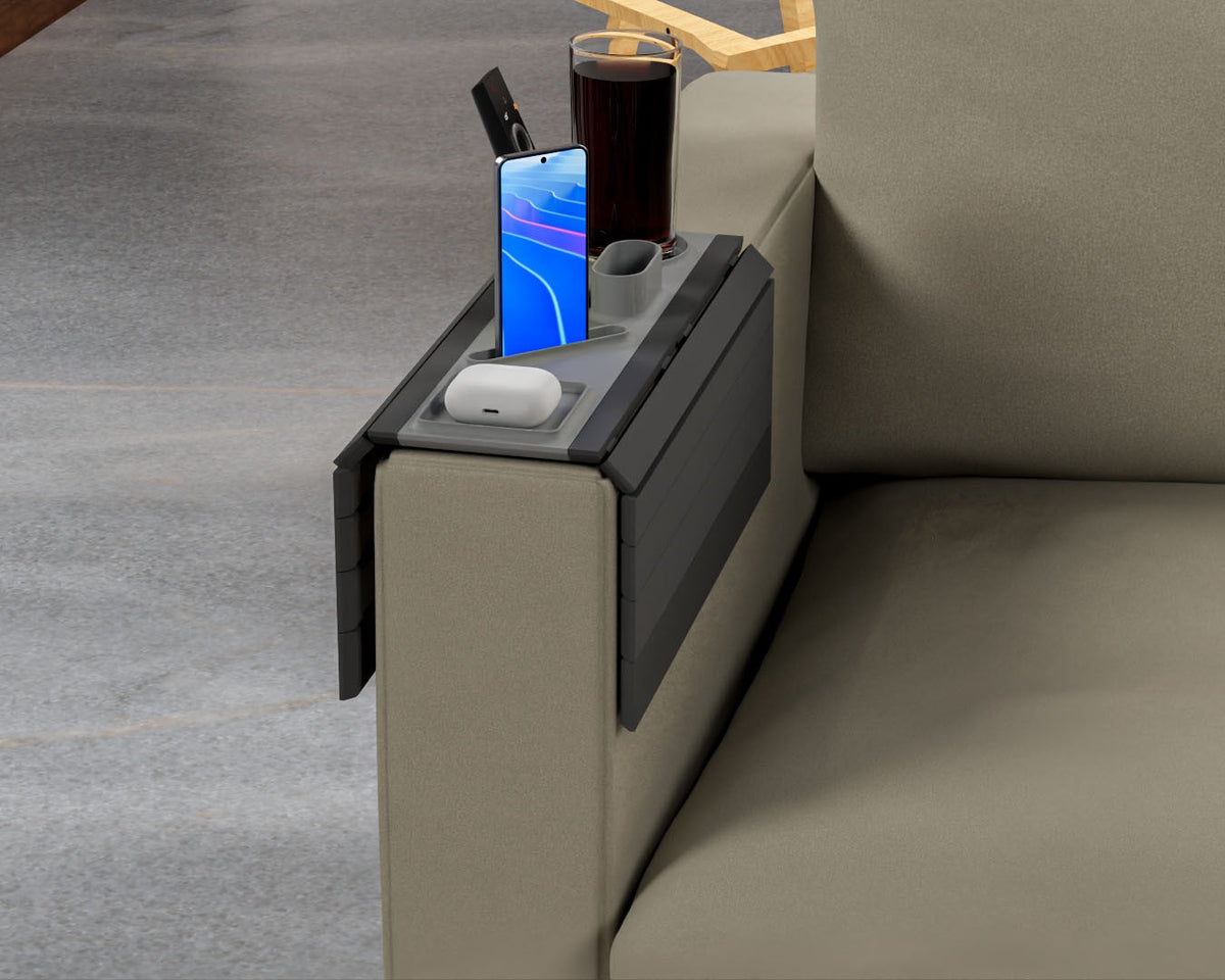 All In — Modular Sofa Side Table — the tray on an olive sofa arm with an upright phone, a drink and an earbuds case.