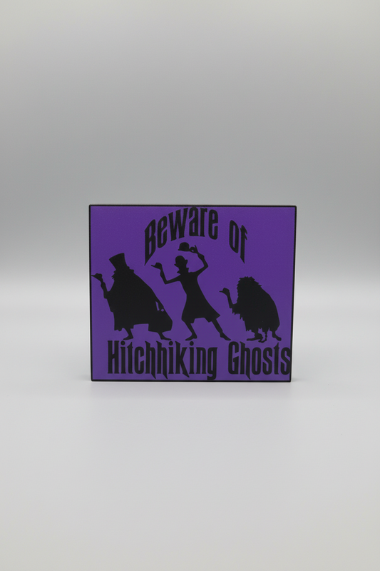 Beware of Ghosts Lightbox — a square purple lightbox with a cut-out silhouette panel and raised lettering, on a soft light-gray studio background.