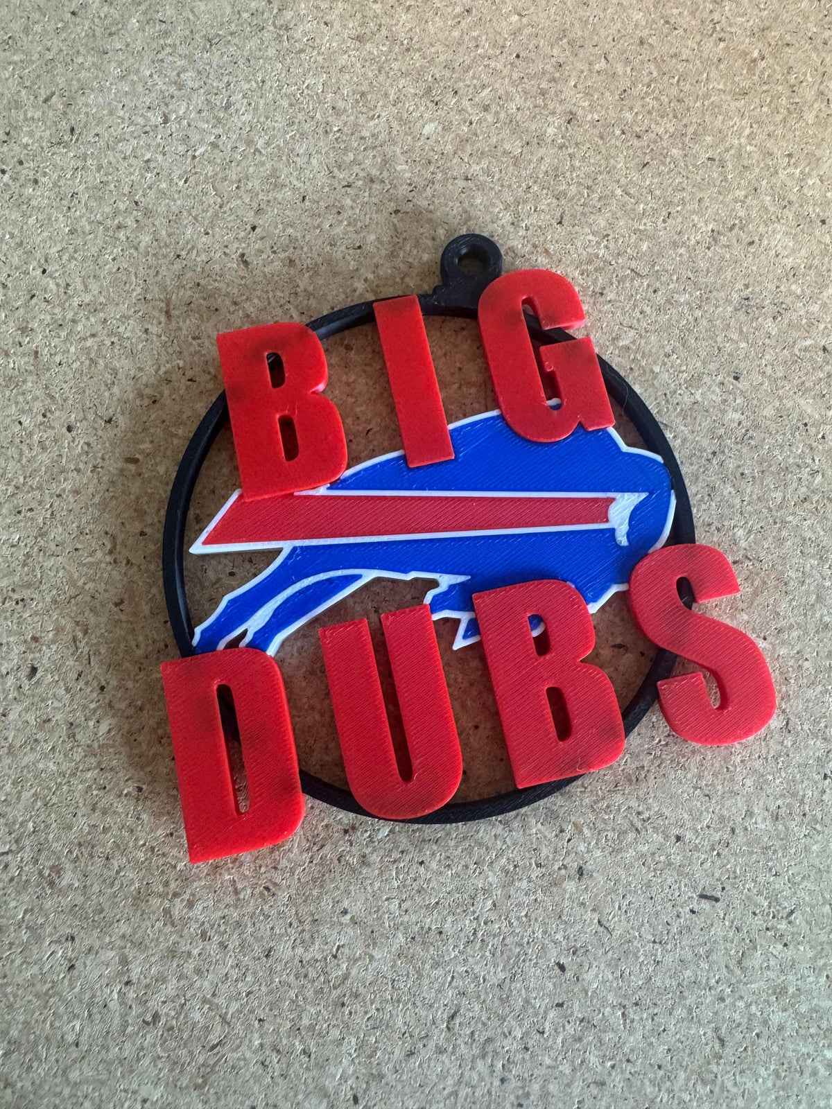 BIG DUBS Buffalo Ornament — a flat layered ornament in red, white and blue with a hanging loop.