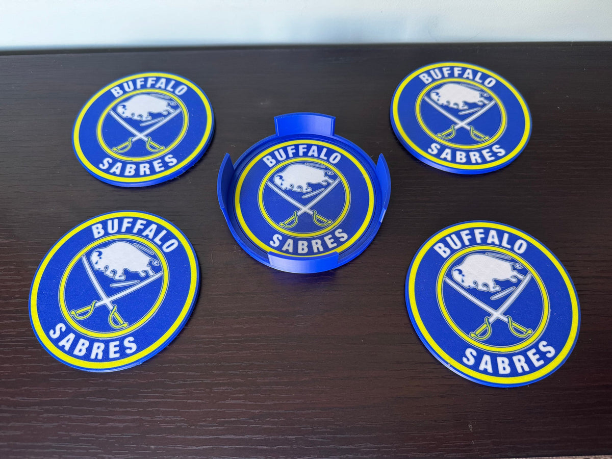 Blue & Gold Hockey Coaster Set with Holder — four round blue and gold coasters with a matching upright holder. 