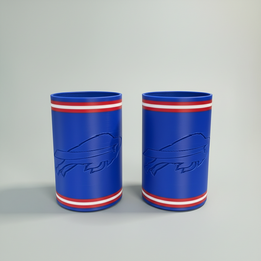 Buffalo Can Sleeves — Set of 2 — two blue insulated can sleeves with red and white striping and a raised side emblem, on black cans, on a soft light-gray studio background.