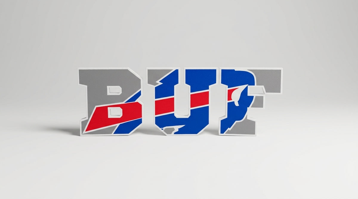 Buffalo Football Varsity Letter Sign — three free-standing layered pieces in blue, red and gray, on a soft light-gray studio background.
