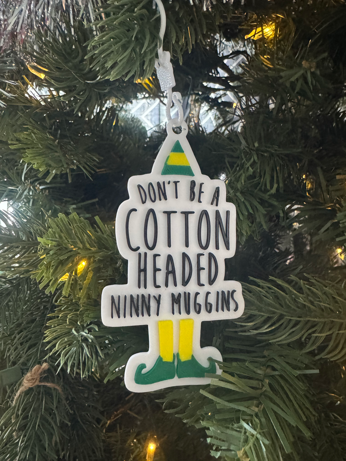 Christmas Elf Ornament — a flat layered ornament with raised lettering and a hanging loop.