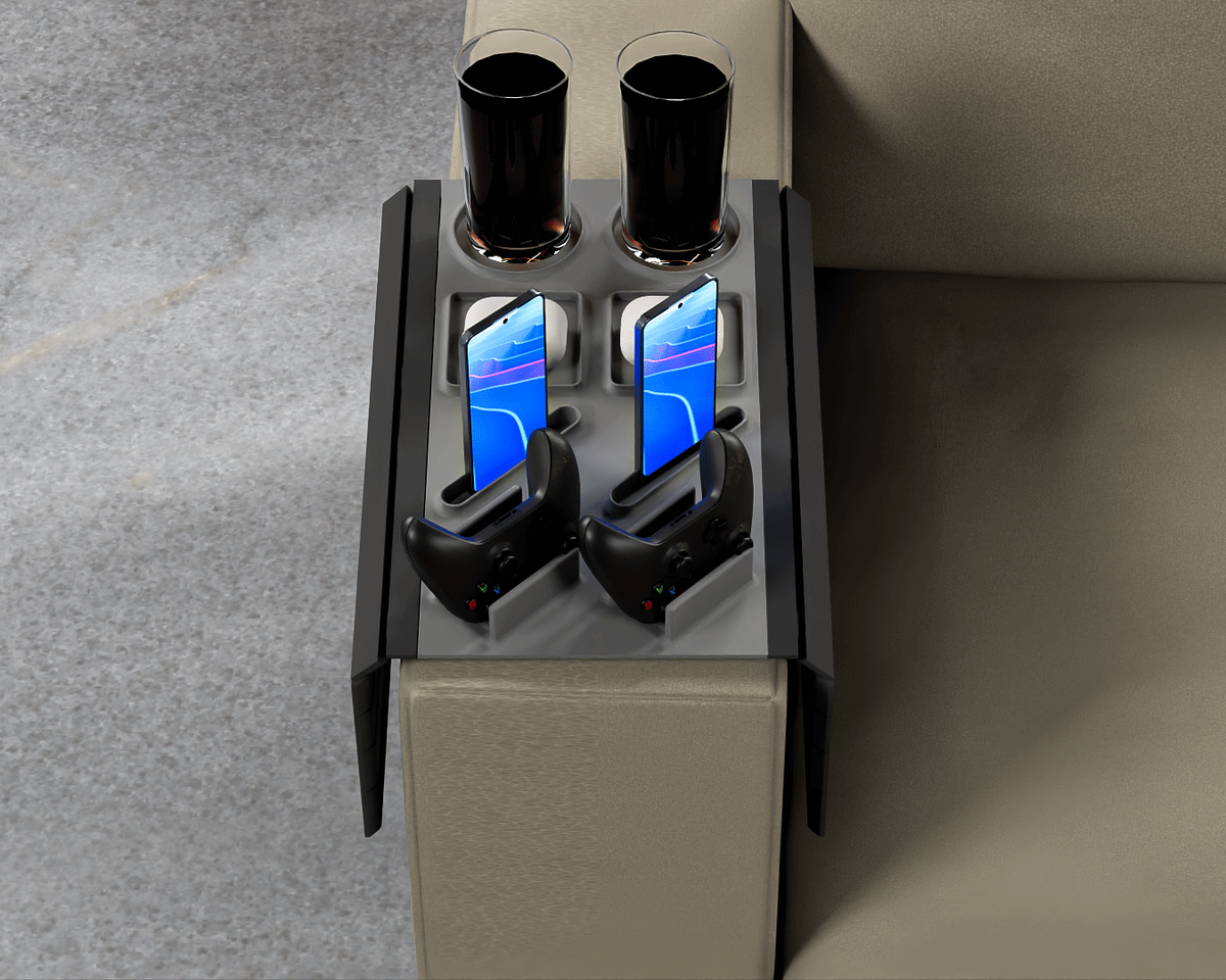Couch Co-Op — Modular Sofa Side Table — overhead-ish view of the two-player layout, drinks above phones and controllers.