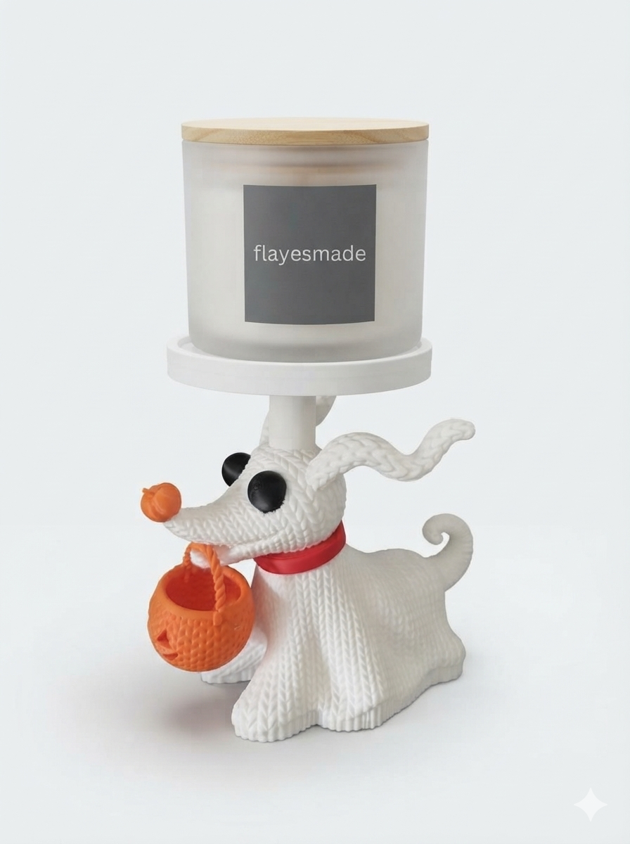 Ghost Dog Candle Holder — white knit-textured ghost dog with black eyes, an orange pumpkin nose, a red collar and a carved jack-o'-lantern bucket in its mouth, holding a lidded frosted-white jar candle on a round platform above its back, on a soft light-gray studio background.