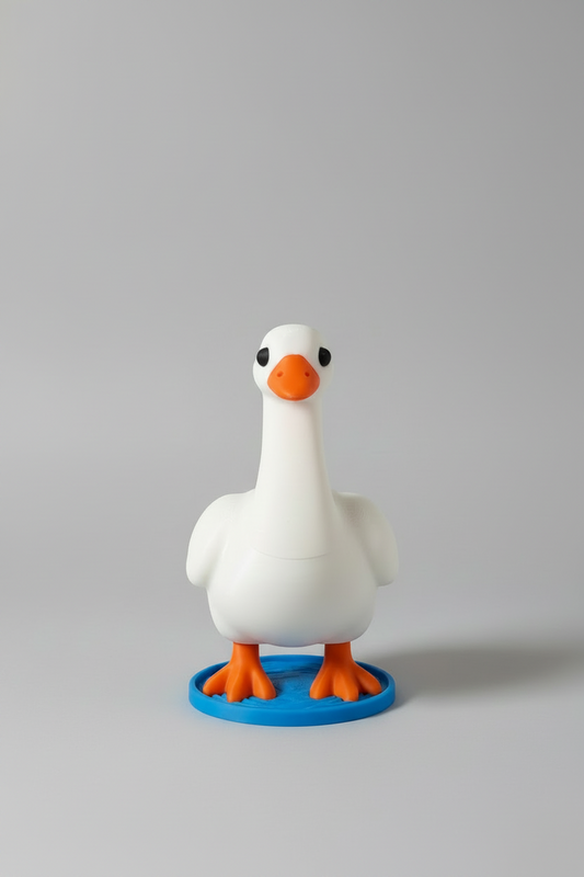 Goose Soap Dispenser Holder — a white goose-shaped holder with an orange beak and feet on a blue round base, on a soft light-gray studio background.