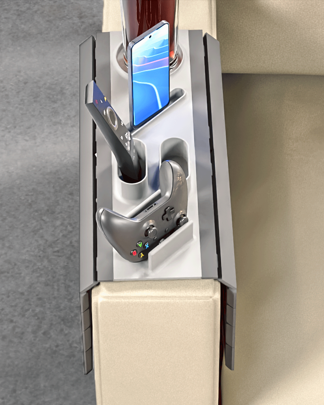 Player One Modular Sofa Side Table — overhead view of the tray showing the controller cradle, phone slot, remote slot and cup holder.